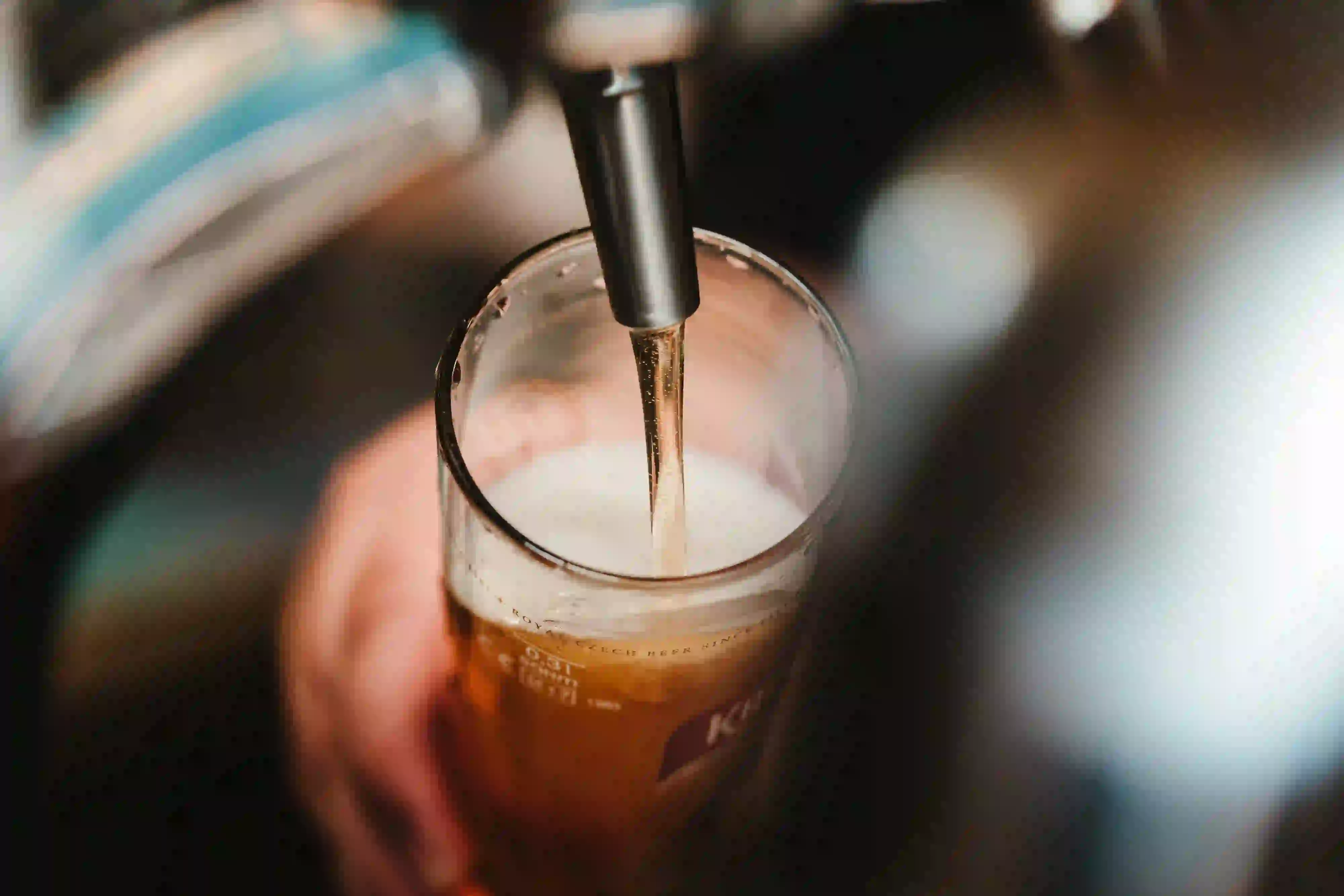beer pouring into glass beer pouring into glass