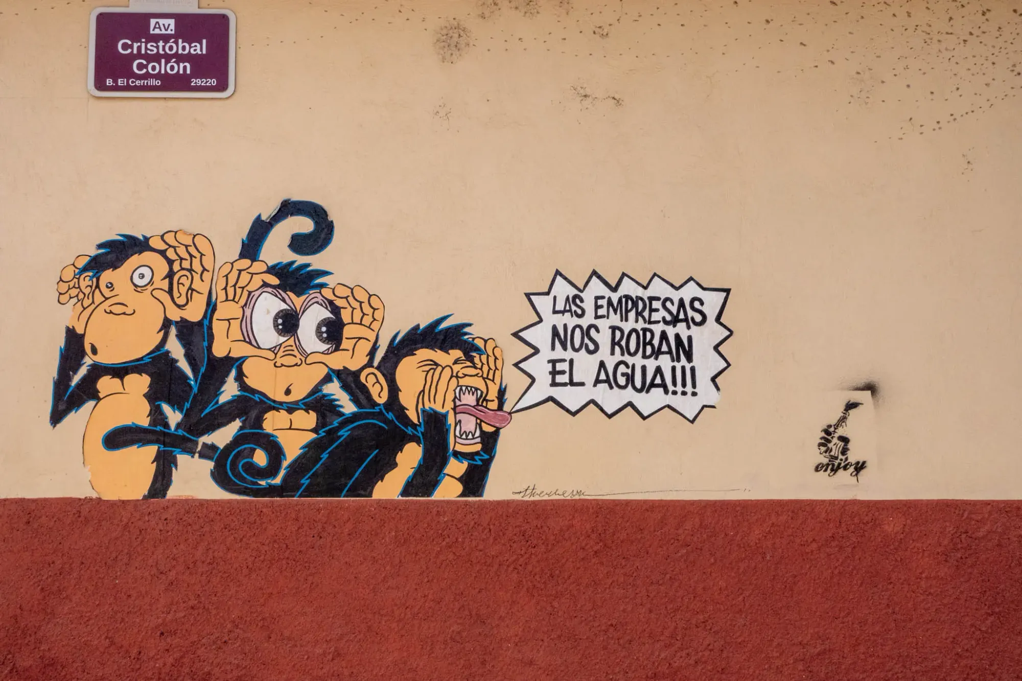Street art saying, "The companies steal our water"