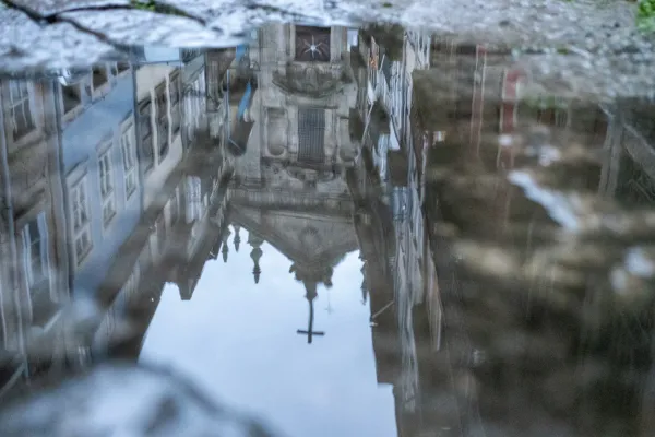 The reflection of a church in Porto