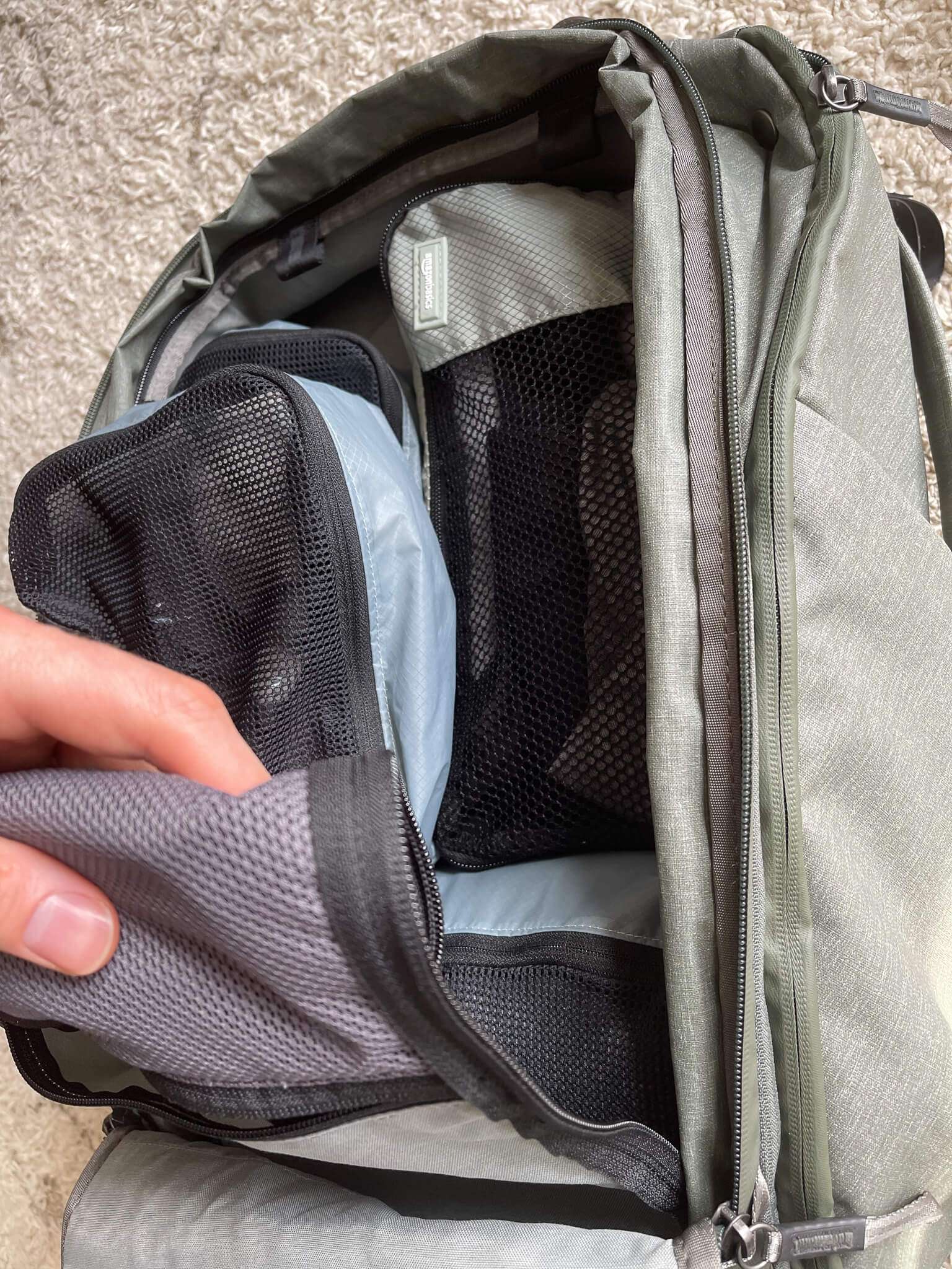 The same divider can roll away, leaving one large compartment.